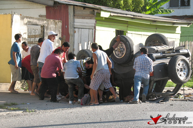 Residents of Santa Elena/San Ignacio Towns Cayo, assist victims of traffic accident Traffic Accident in Santa Elena/San Ignacio Towns Cayo, Car flips four times