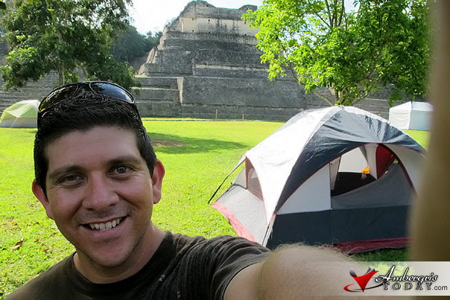 Dorian Nunez pitches tent at Caracol Maya Site Maya Spring Equinox at Caracol Maya Site, Belize