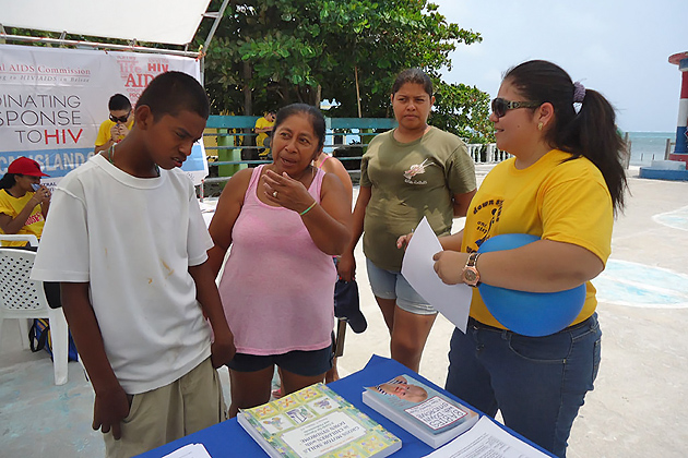 Belize Down Syndrome Association shares information with attendees at Caye Caulker Health Fair National AIDS Commission Held Health Fair in Caye Caulker