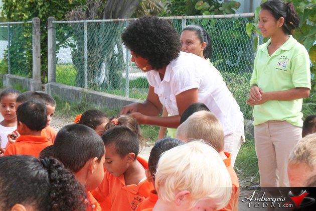 PUP - BRS Standard Bearer hands out sweets to the children during the parade