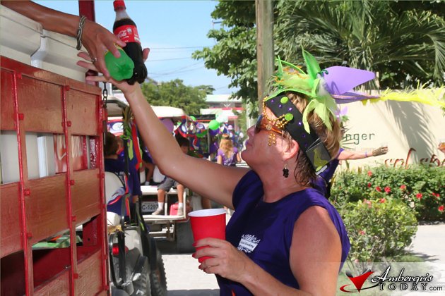 A Closer Look at Independence Day Parade 9 Lady Dixie Bowen spreads the cheer with Belikin Beer and Coke Products