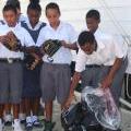 San Pedro Sports Council Donates Softball Equipment to Holy Cross 