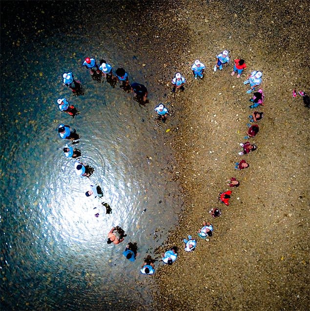 Belizeans Gather Across the Country for Hands Across The Sand