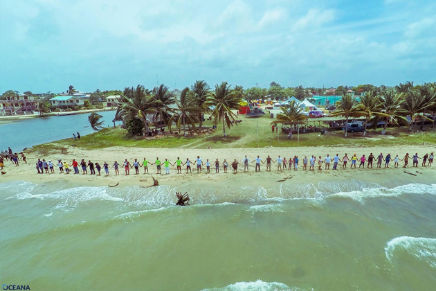 Belize Across the Nation Hold Hands - Hands Across the Sand - Oceana Belize