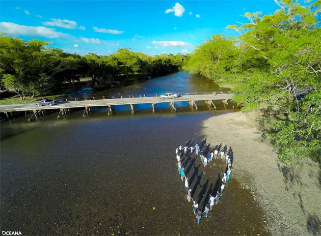 Belizeans join hearts and hands to show their love for marine resources - San Ignacio Town A Love Letter to the Caribbean Sea from Belize