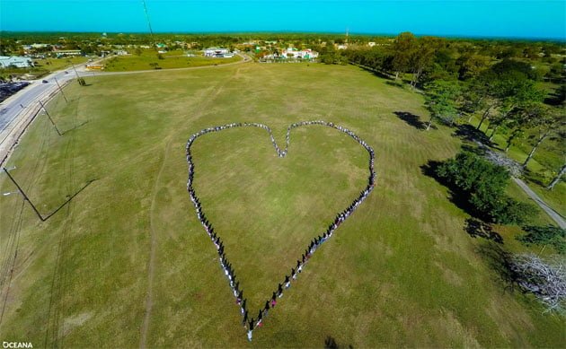Belizeans join hearts and hands to show their love for marine resources - Belmopan A Love Letter to the Caribbean Sea from Belize