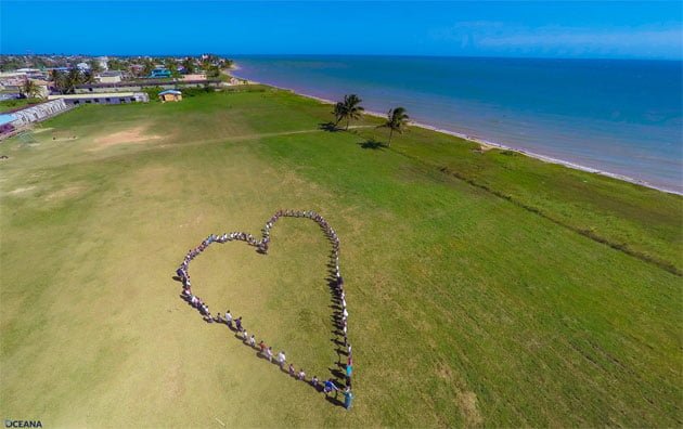 Belizeans join hearts and hands to show their love for marine resources - Dangriga Town A Love Letter to the Caribbean Sea from Belize