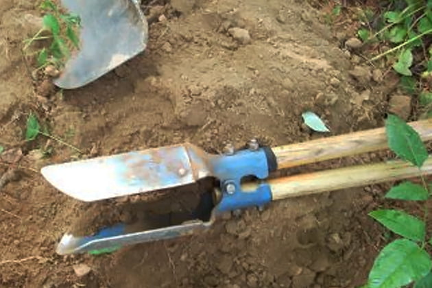 Old, vintage post hole digger