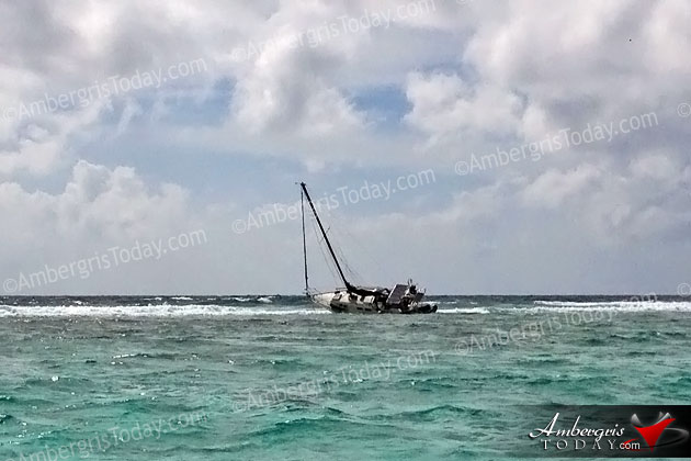 Private Sailboat Stuck on Reef by Hol Chan Marine Reserve