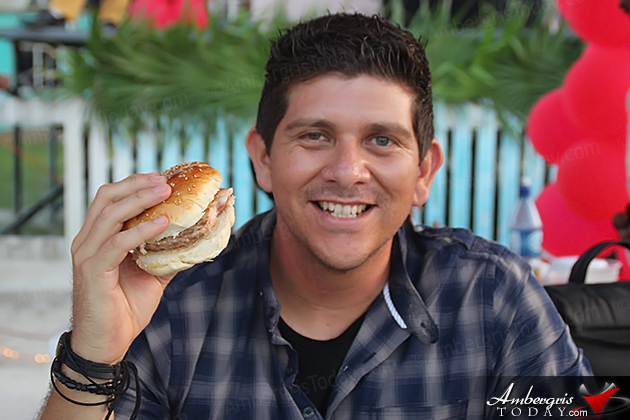 Ambergris Today's Editor, Dorian Nunez, was a judge; here enjoying a lobster burger Casa Picasso Tops Lobster Fest in San Pedro, Belize