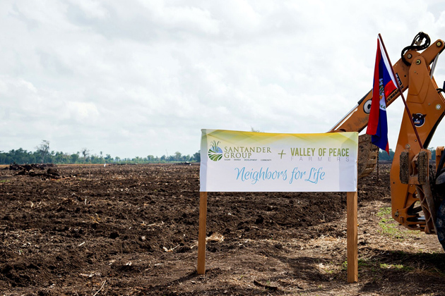 Belizean Farmers receive land from The Santander Group