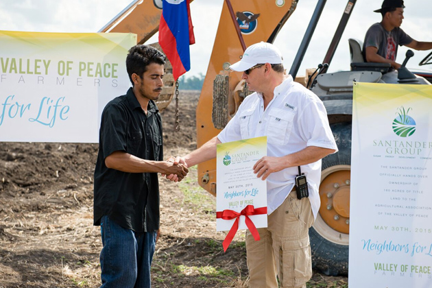 Belizean Farmers receive land from The Santander Group