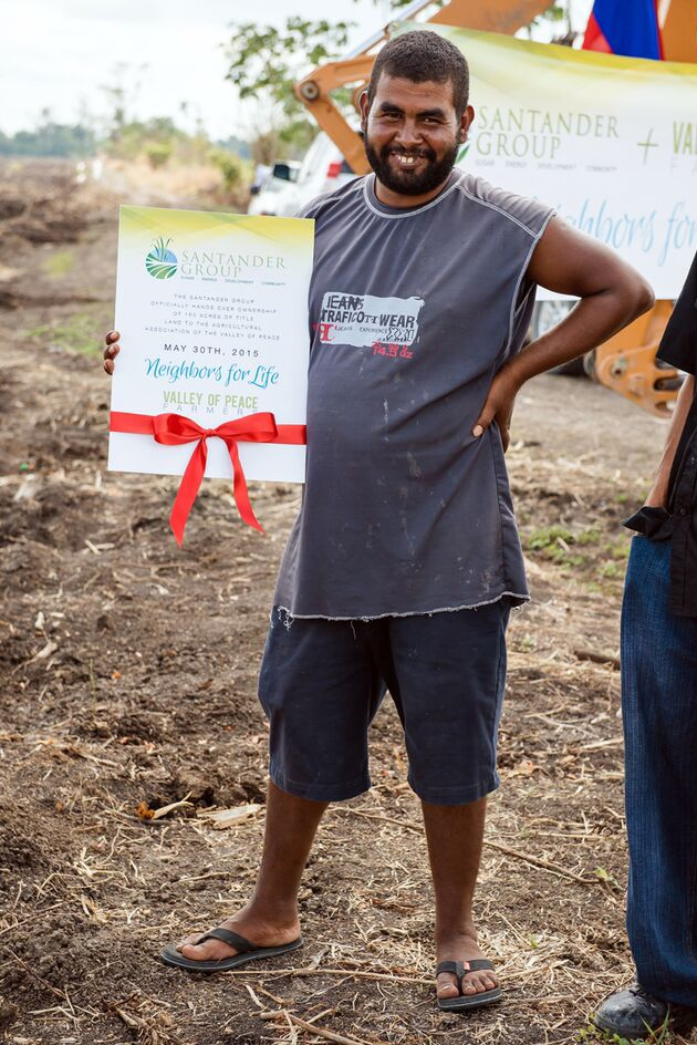 Belizean Farmers receive land from The Santander Group
