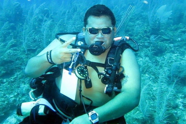 Rolando Caceres, dive master at Ramon's Village Dive Shop Local Belize Divers Encounter Pod of Sperm Whales in Migration