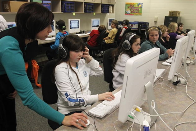 Modern Students at school with computers