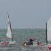 Bailing water, another challenge for the sailors on a windy day