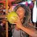Coconot Leo takes a drink of fresh coconut water