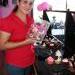 Perlita prepared an order of cupcakes to go.