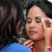 Deborah shows thos in attendance how to properly apply eyebrow make-up.