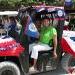 Mayor Elsa Paz and Mrs. Mila Phillips on the Independence Day Parade