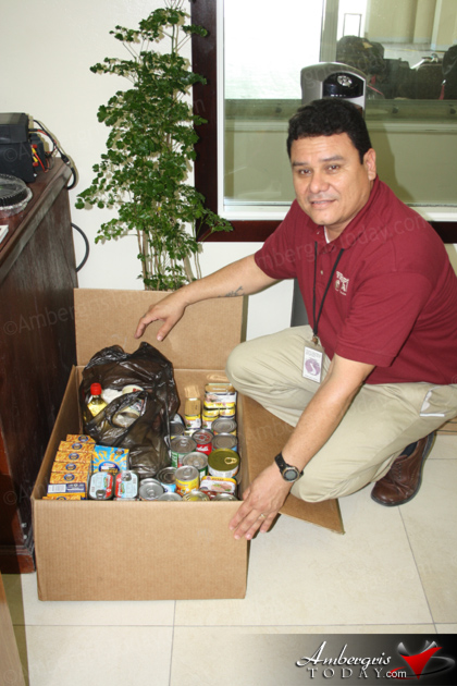 Tropic Air Assists Six Families with Christmas Food Drive