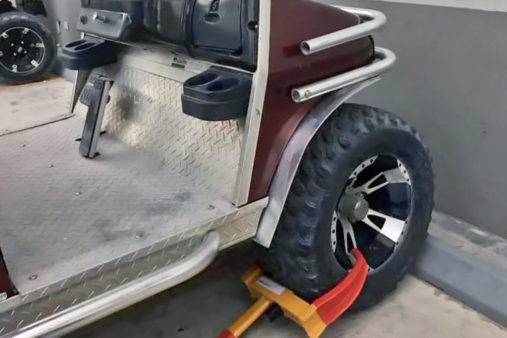 Why Does This Golf Cart Wheel Clamp Have Islanders in Dispute? 2