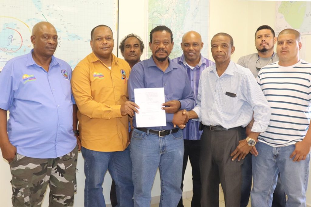 Belize Minister of Transport Signs New Statutory Instrument Regarding International Buses 11