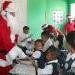 Santa and Town Council Gift-giving school children