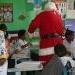 Santa and Town Council Gift-giving school children