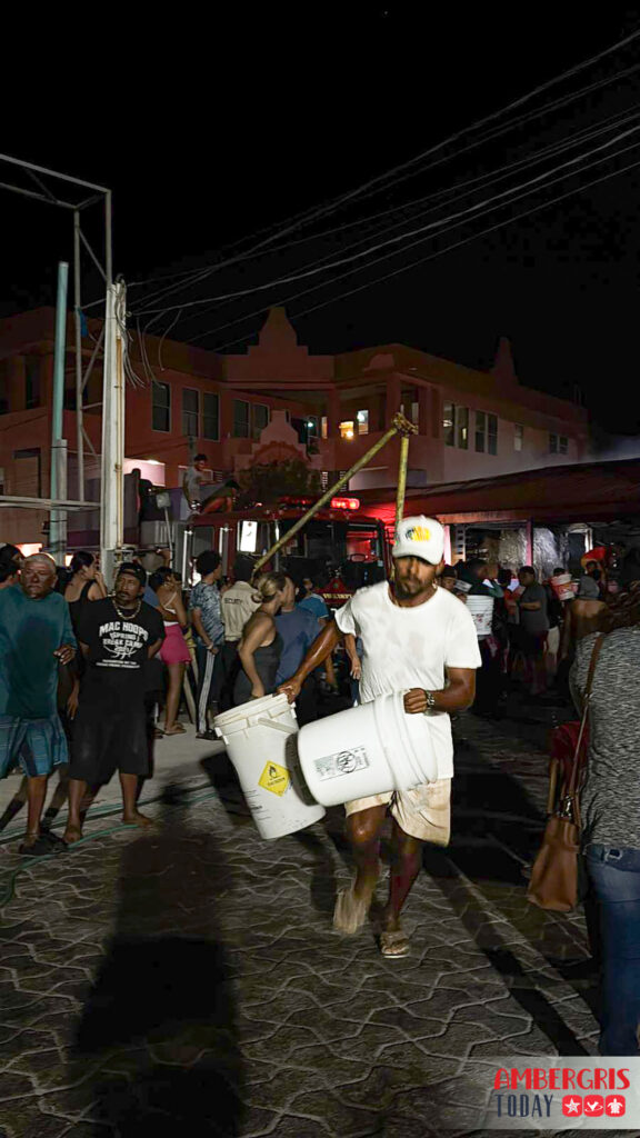 bucket brigade assists firefighters in downtown san pedro