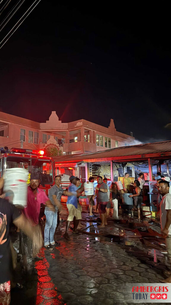 bucket brigade assists firefighters in downtown san pedro